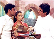 Ajay Devgan, Aishwarya Rai and Amitabh Bachchan in a still from Hum Kisise Kum Nahin 