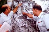 Jacob and Chandla with a map of the Kargil sector