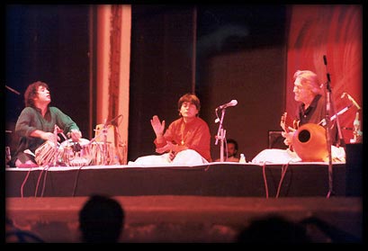 Zakir Hussain, U Srinivas, John McLaughlin